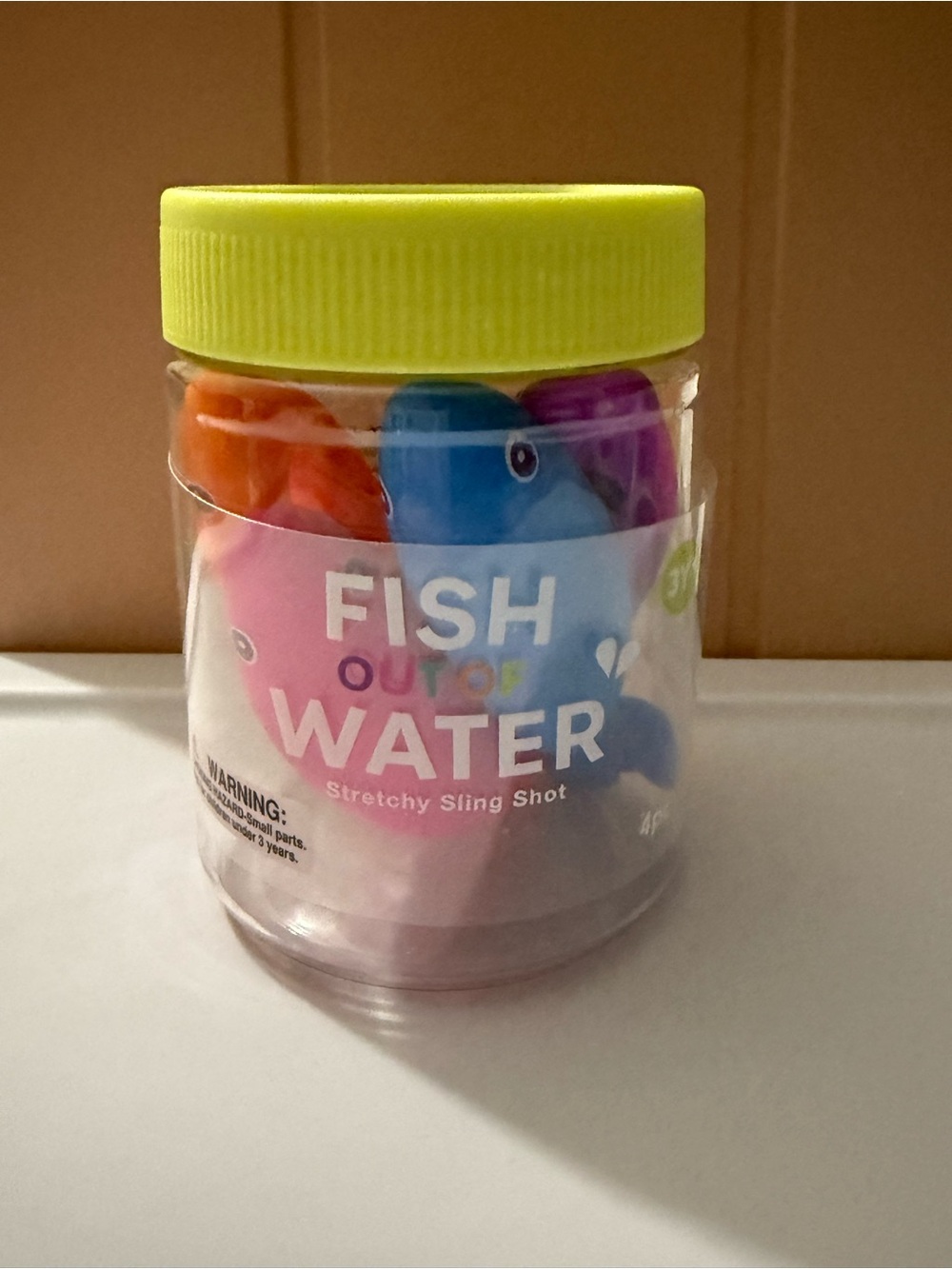 Adore Stretchy Fish Toy Set - Yellow Lid with Blue, Pink, Orange, Purple Fish